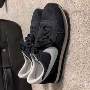 Size 8.5 Nike black and white casual sneakers